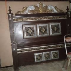 wooden double bed