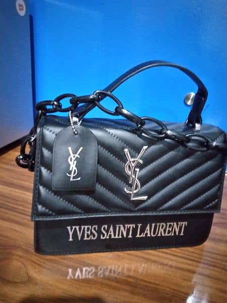 imported yves saint Lourent hand bag. 2