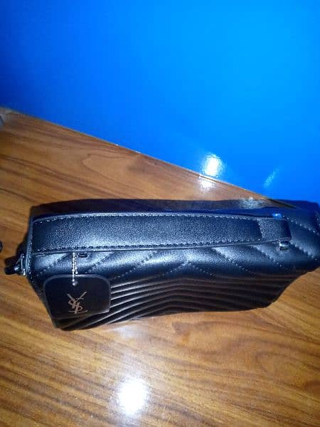 imported yves saint Lourent hand bag. 4