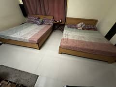 Two queen sized beds with mattress