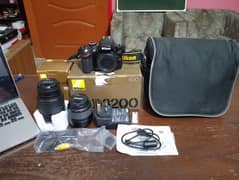 NIKON-D3200 WITH 2 LENSES 18-55 MM AND 55-200 MM WITH ORIGNAL BOX . 0