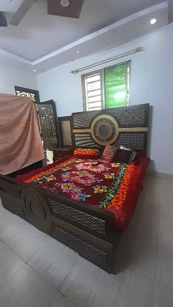 bed with side tables and wardrobe with sliding doors 1