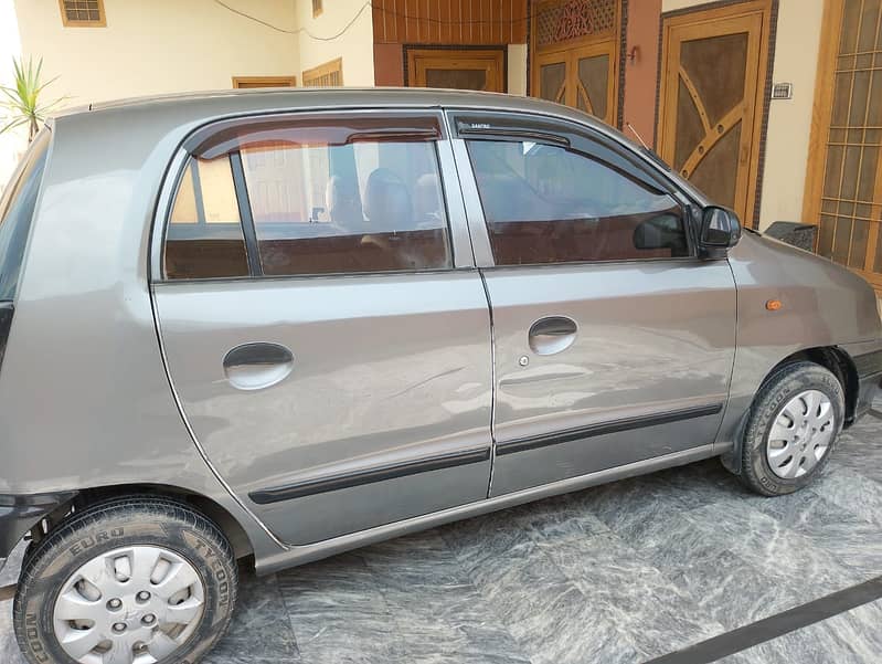 Hyundai Santro 2004 club 11