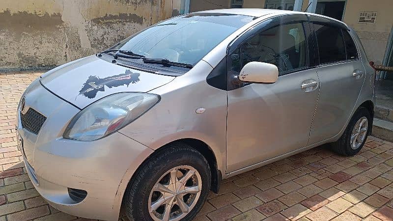 Toyota Vitz model 2006 and Rajister 2009 5