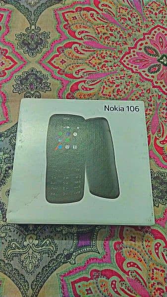 Nokia 106 with box and charger 3