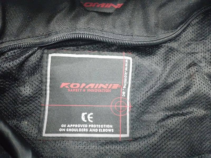 Original Imported Komine JK-061 titanium motorcycle touring Jacket. 6