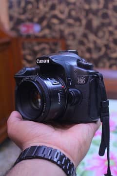 Canon 60d with 50mm f/1.8 professional dslr.