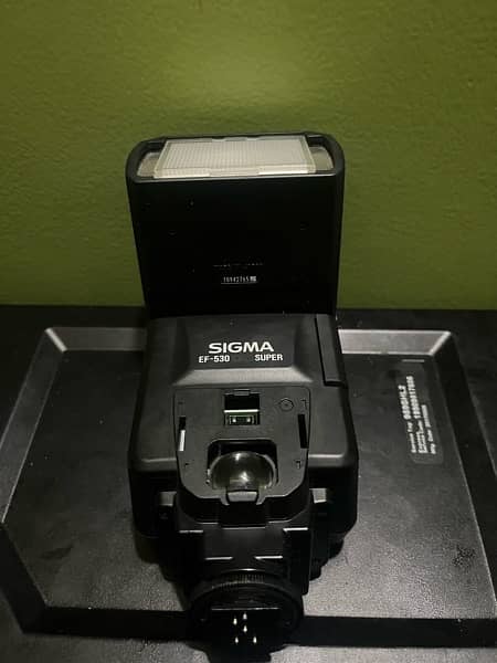 canon 60d 50 mm lens with sigma flash good condition 3