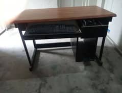 computer table Steele and sold wood mixed.