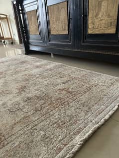 White and rust almost brand new lounge carpet 0