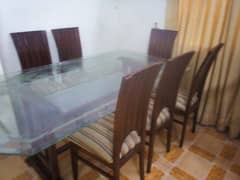 Six sitter dinning table with chairs