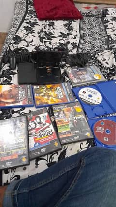 play station 2 with 8 cds