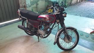 honda 125 in red