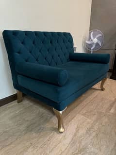 green velvet sofa