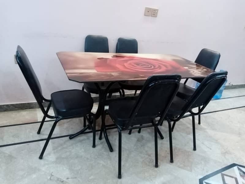 Slightly used dinning table with 6 chairs 2