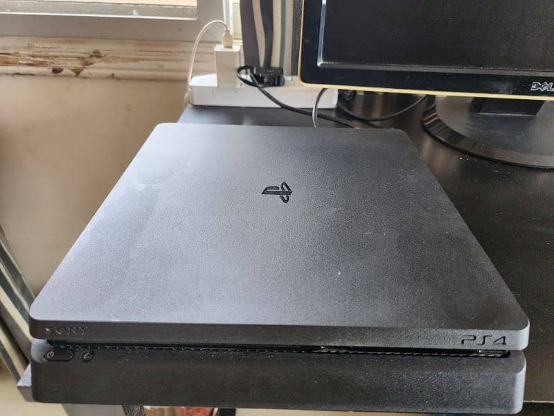 ps4 slim with monitor and 5 games 1