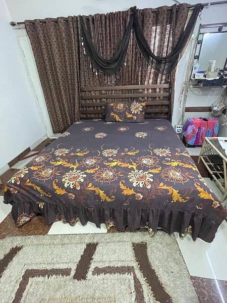 King size rod iron bed with matress and dressing mirror. 0