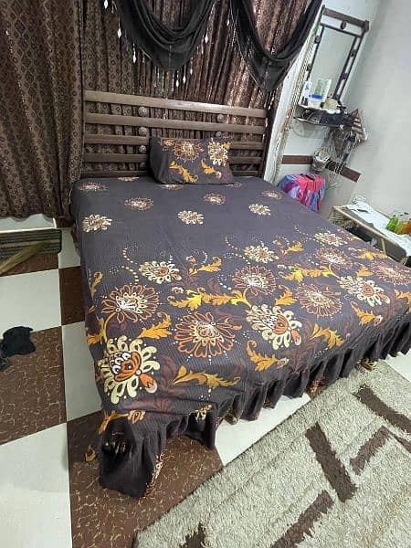 King size rod iron bed with matress and dressing mirror. 1