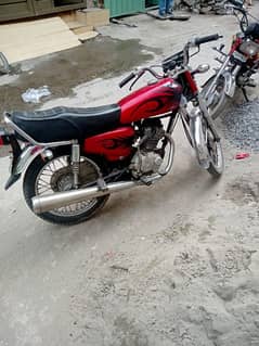 Honda 125.   (03234250686)