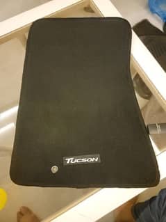 slightly used Tucson genuine mat