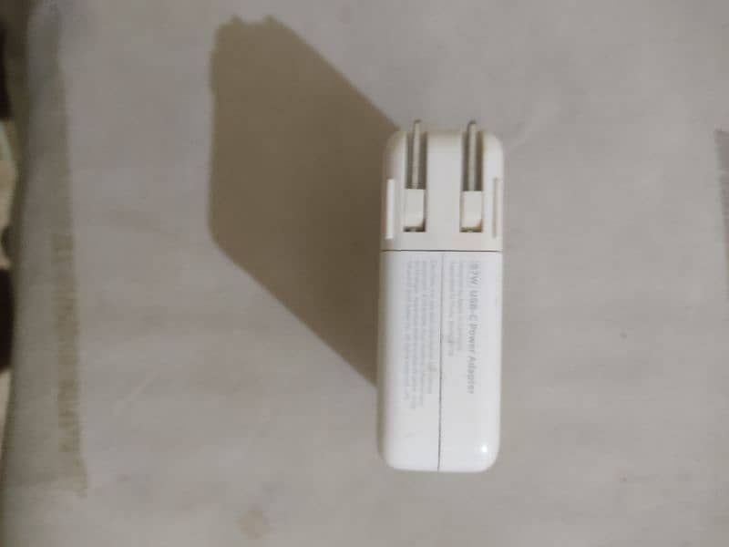 I am sale MacBook original charger 87w 0