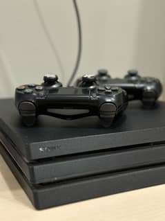 PS4 Pro 1TB with 2 Controllers 0