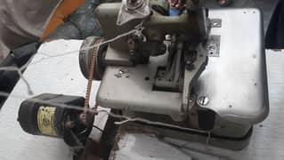 Indian overlock machine with table in perfect working condition