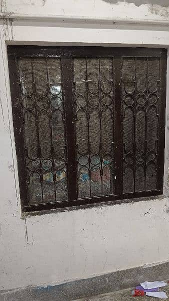 4x4 size , Wooden  Window with iron grill. 0