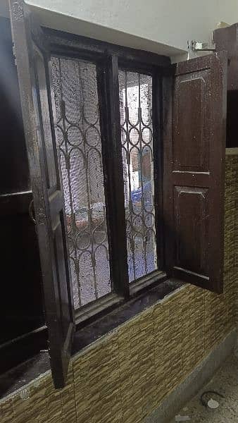 4x4 size , Wooden  Window with iron grill. 1