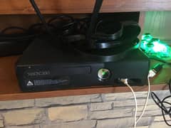 Xbox 360 slim with 28 installed Games gta 5 assassin creed , and more 0