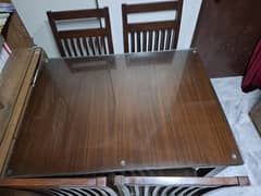 Wooden dining table with 4 chairs