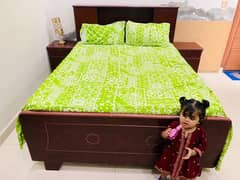 king size bed with side table and spring mattress 0