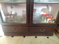 wooden cabinet for sale at very reasonable price in ok condition. .