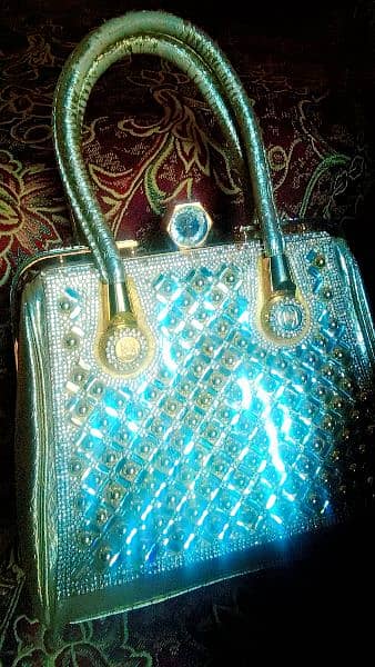 Golden fancy hand bag 2