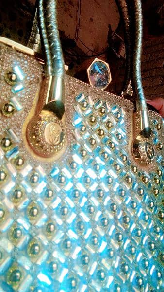 Golden fancy hand bag 3