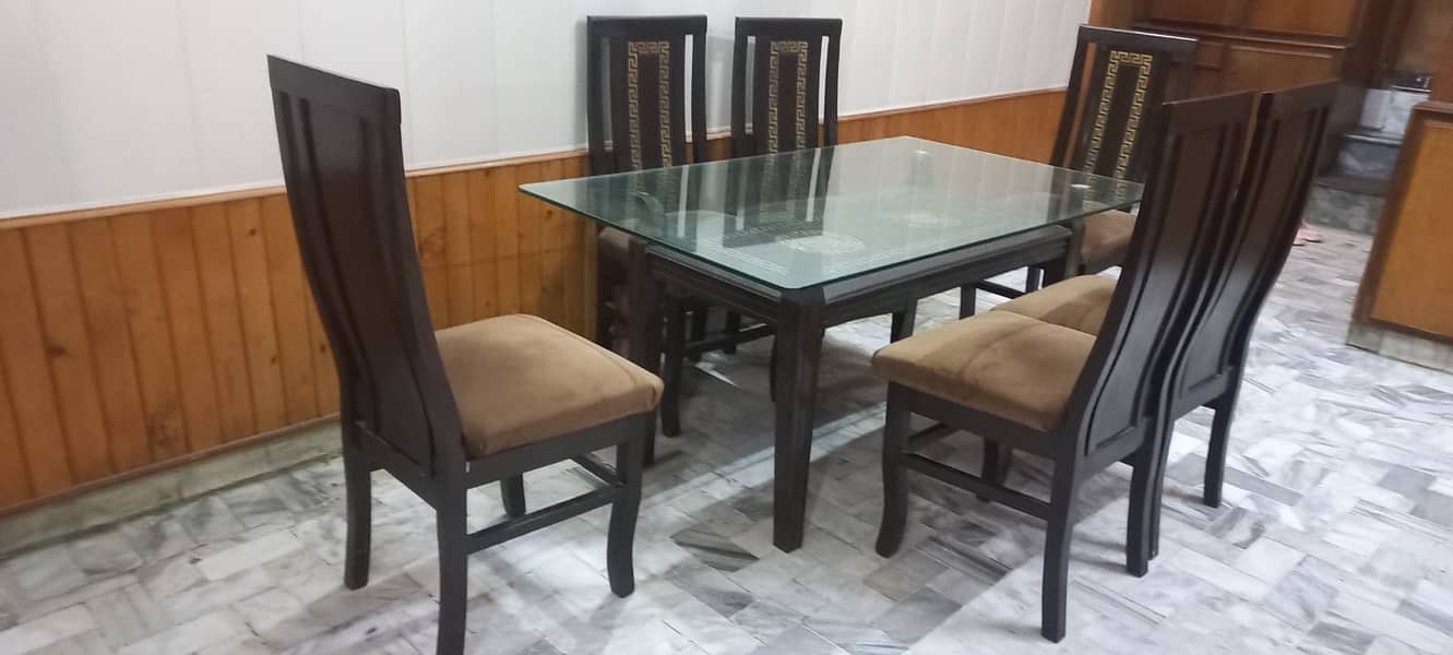 Glass dining table with 6 chairs 1