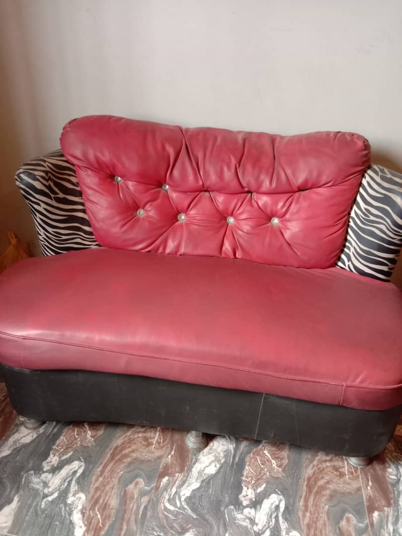 Only 2 years old used 7 seater sofa set with table and sofa covers 1