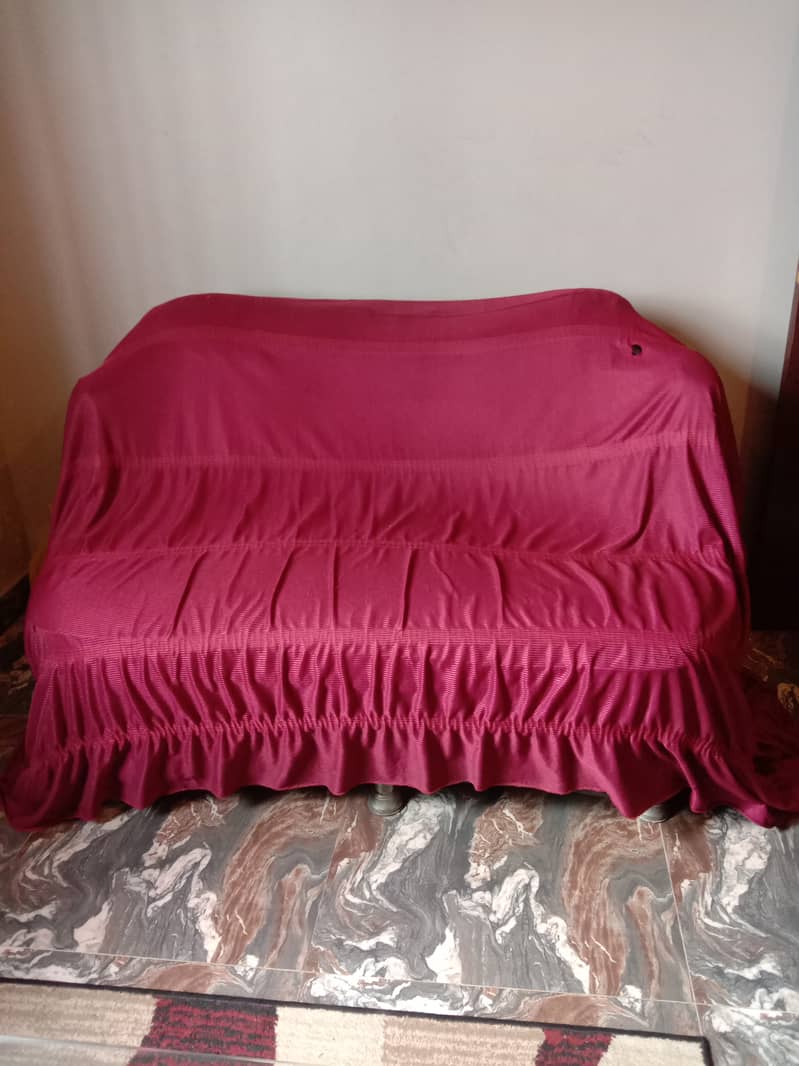 Only 2 years old used 7 seater sofa set with table and sofa covers 3