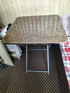 Brand new folding brown colour table for sale