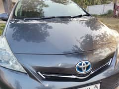 Toyota Prius Alpha model 2012 registered 2015