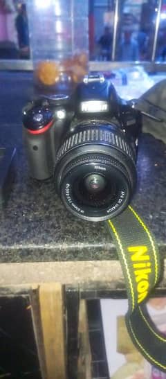 nikon d5100 + 18-55 lence + battery + charger + memory card + bag 0