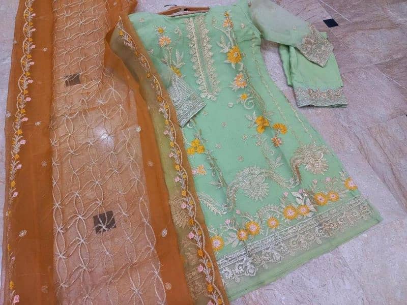 3 pc women stitched Organza embroidered suit. 1