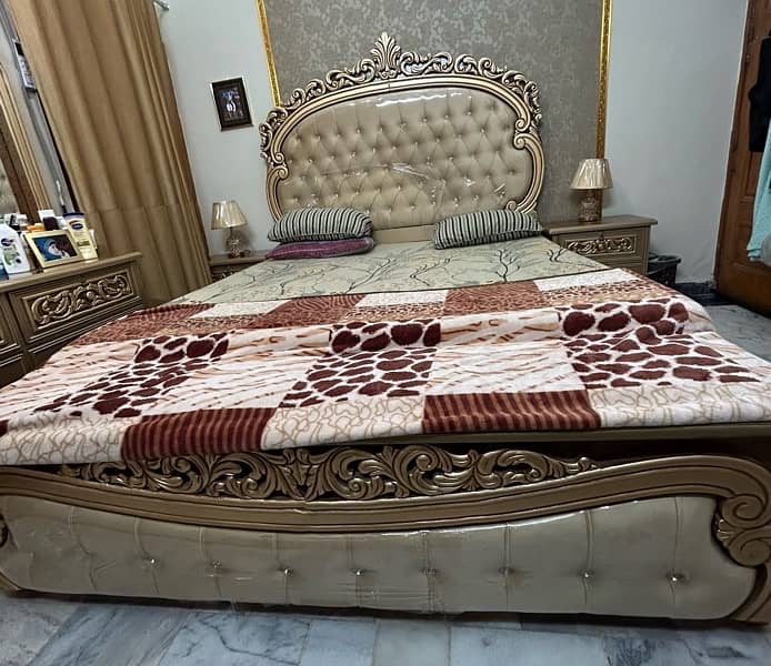 king size bed with 2 side tables and dressing table 4