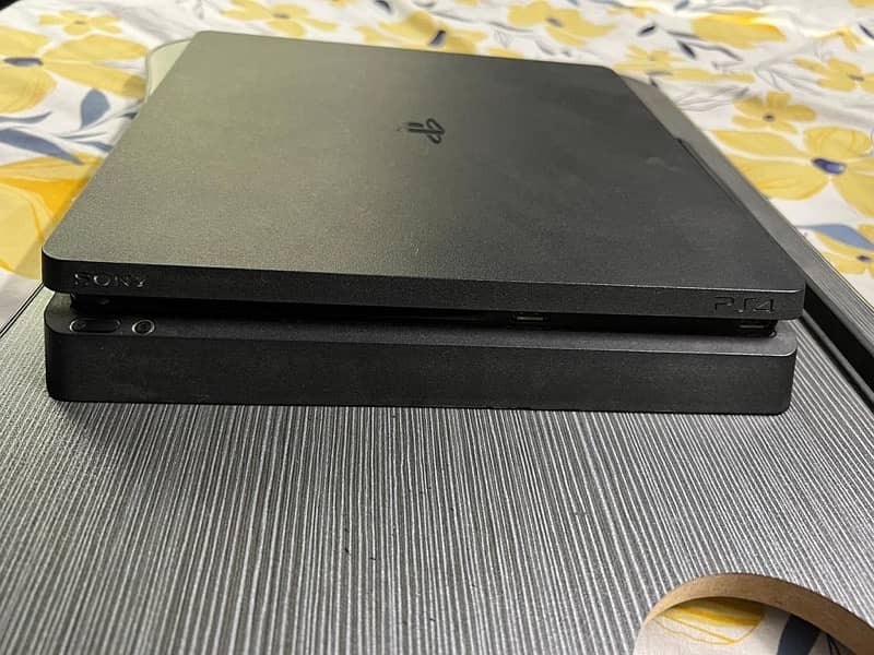 ps4 slim 1tb with 12 gaming dics 0