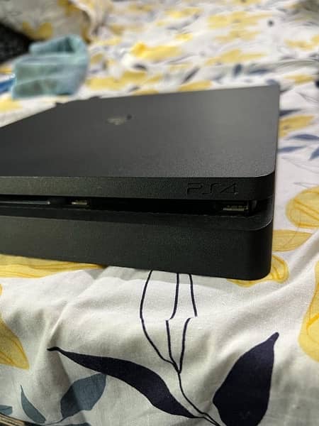 ps4 slim 1tb with 12 gaming dics 6