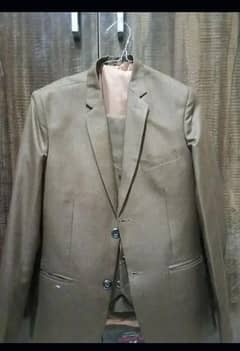 Three piece brown suit condition 10/10 0