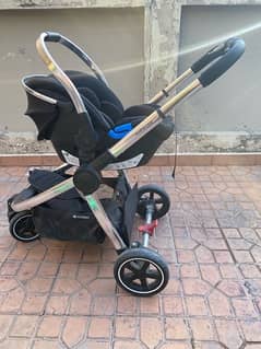 mothercare pram and baby carrier/ baby swing