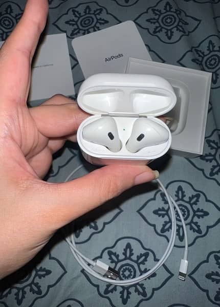 Original Apple Airpods generation 2 with charging case. MV7N2ZP/A 1