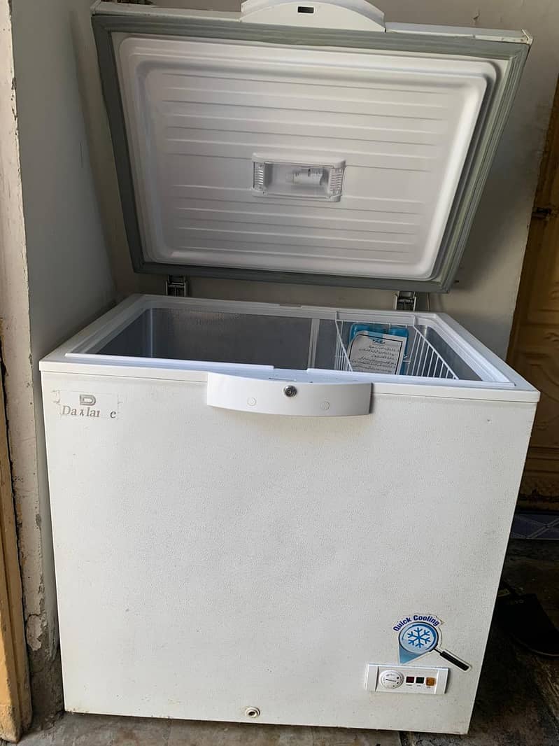 selling dawalance deep freezer good condition 1 time used 0