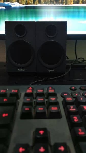 Logitech Z333 2.1 and Creative GigaWorks T20 2